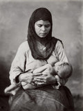 Egyptian woman breast-feeding a baby vtg. photo late 19thC.